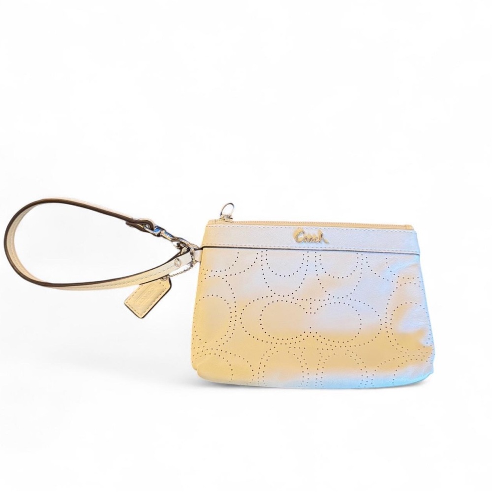 Coach Embossed Perforated Ivory Leather Wristlet